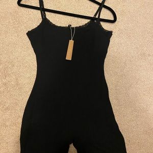 Skims soft lounge lace onesie